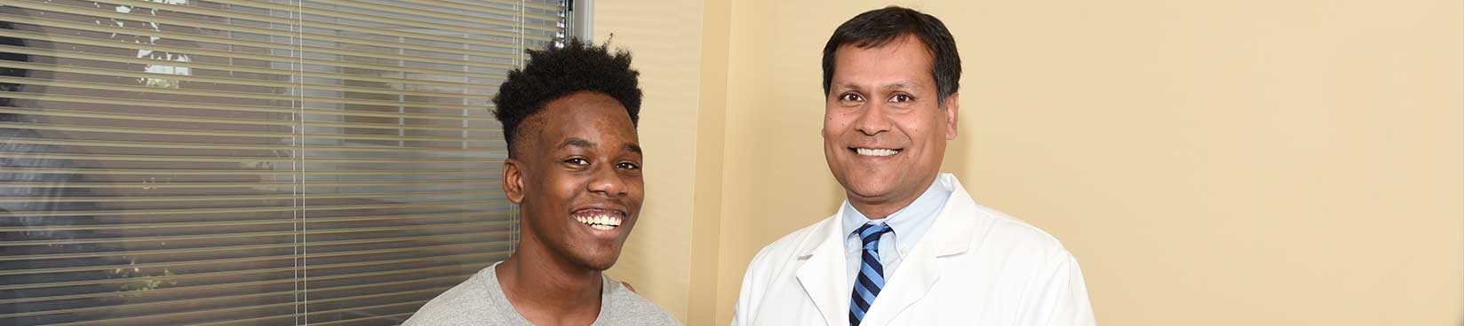 Image of Dr Kushwaha with Scoliosis Patient Breelon Bullock