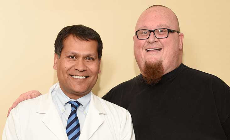 Image of Dr Kushwaha with Spinal Fusion Patient Kenneth Cucksee